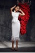 Dress with open back and a belt from feathers