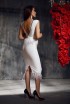 Dress with open back and a belt from feathers