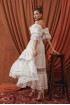 Cotton suit with fringe with skirt