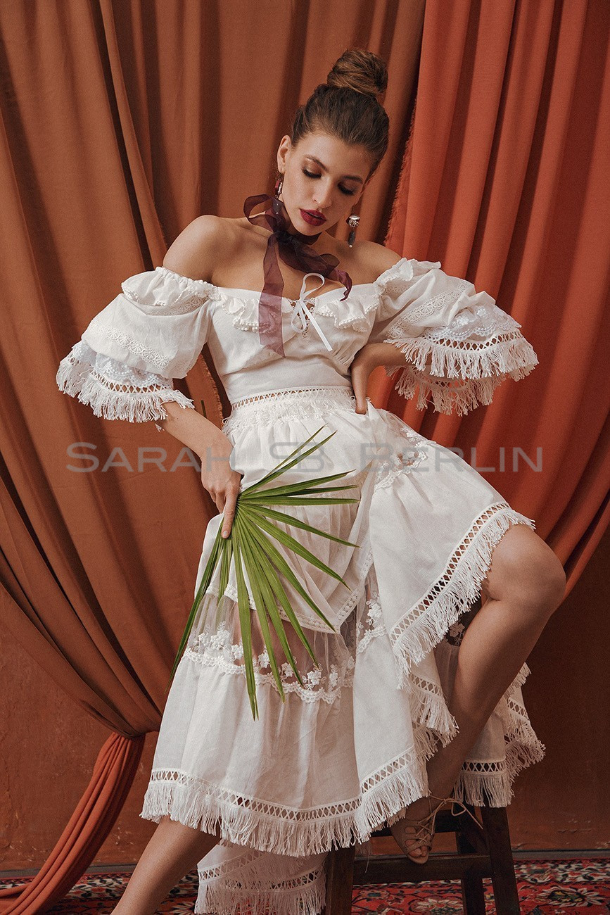 Cotton suit with fringe with skirt