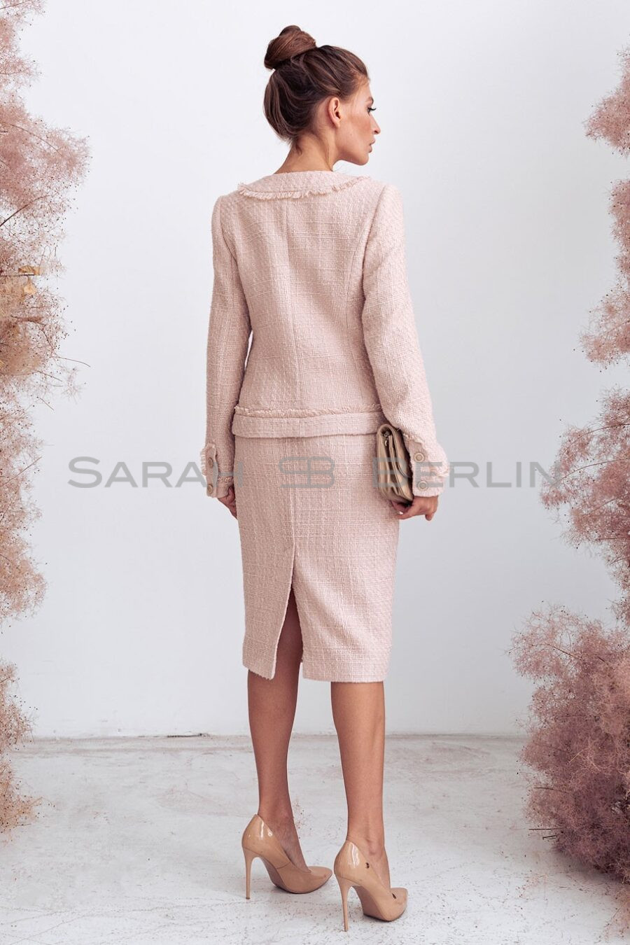 Tweed suit with fringed skirt