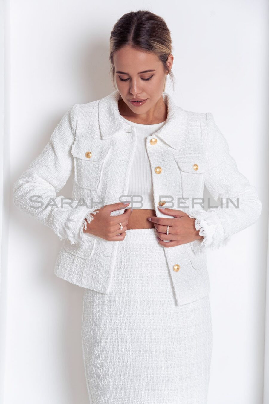 Tweed suit with fringed pockets with skirt