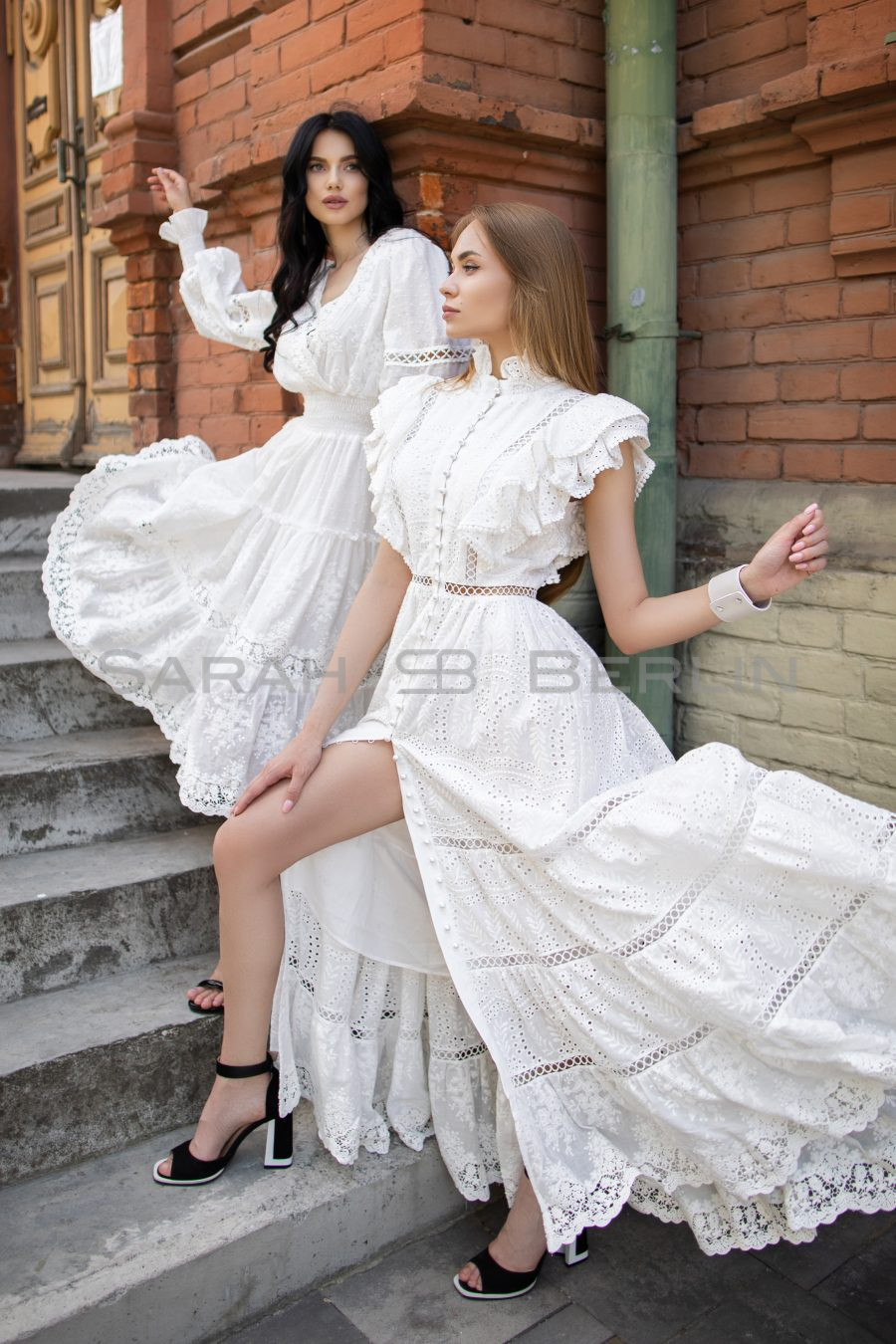 Floor-length dress in embroidered cotton with lace and wings