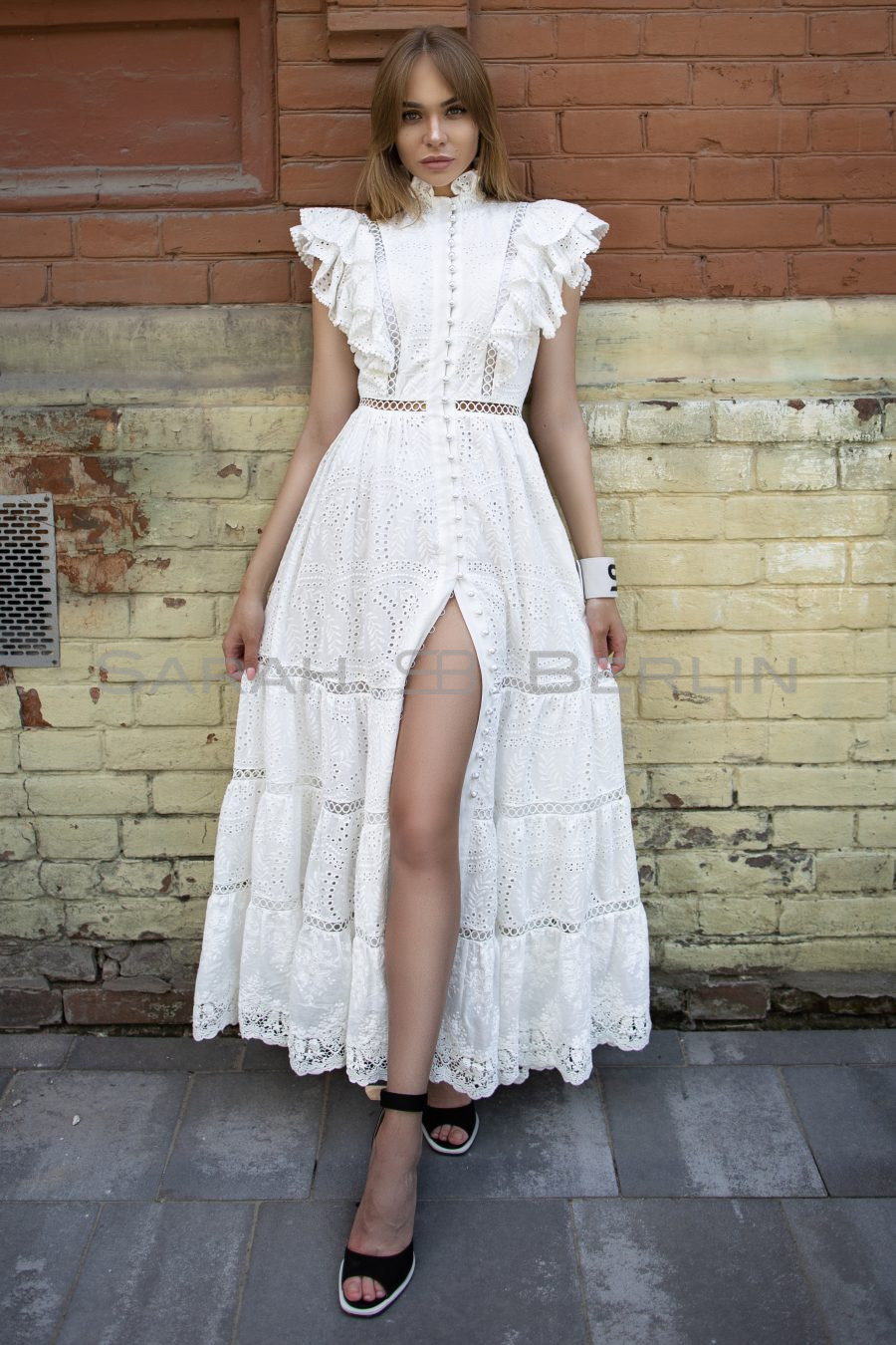 Floor-length dress in embroidered cotton with lace and wings
