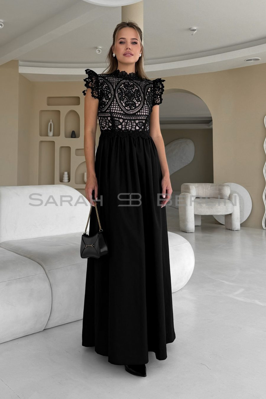 Floor-length dress with macramé lace and wings