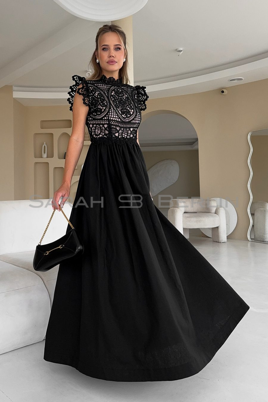 Floor-length dress with macramé lace and wings