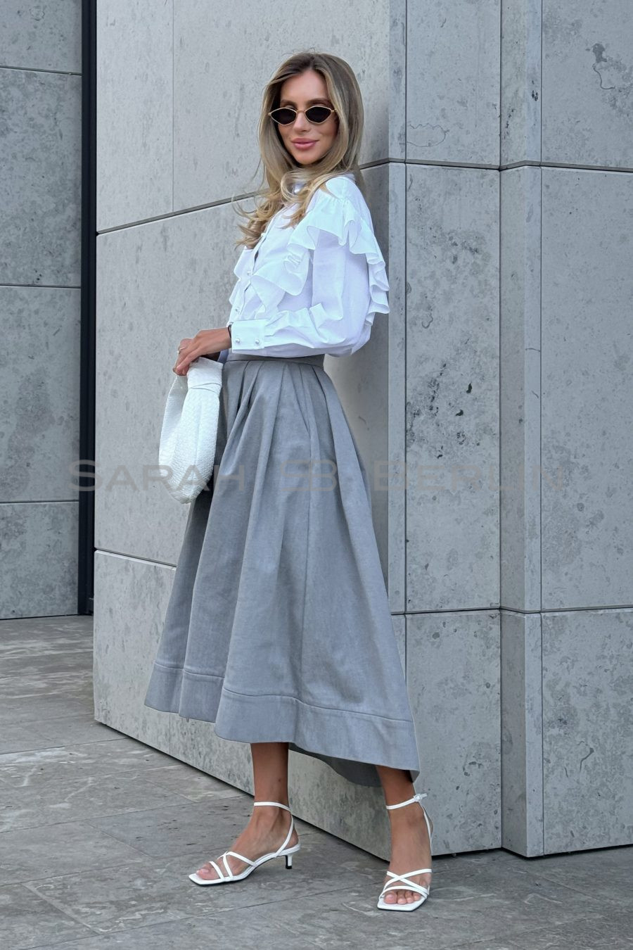 A-line skirt with pleats, made of suiting fabric