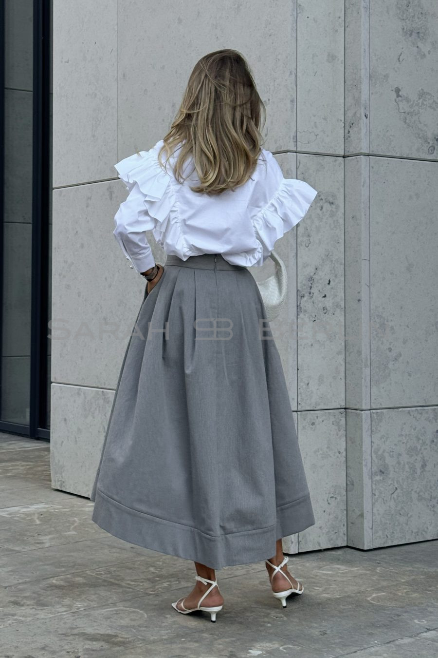 A-line skirt with pleats, made of suiting fabric