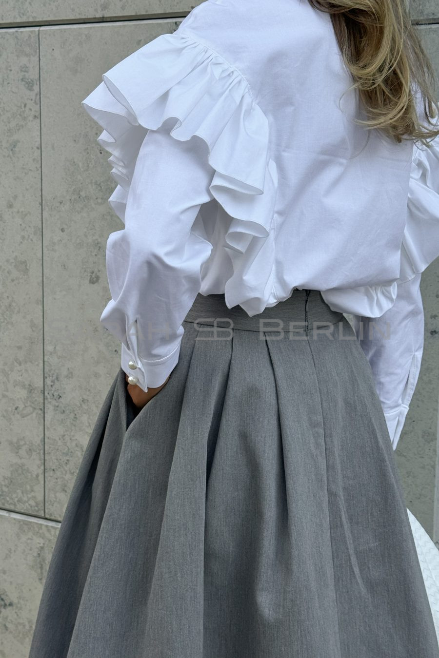 A-line skirt with pleats, made of suiting fabric