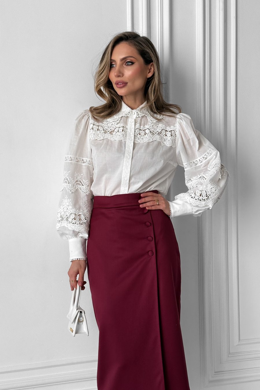 White cotton blouse with embroidery, puff sleeves and concealed fastening