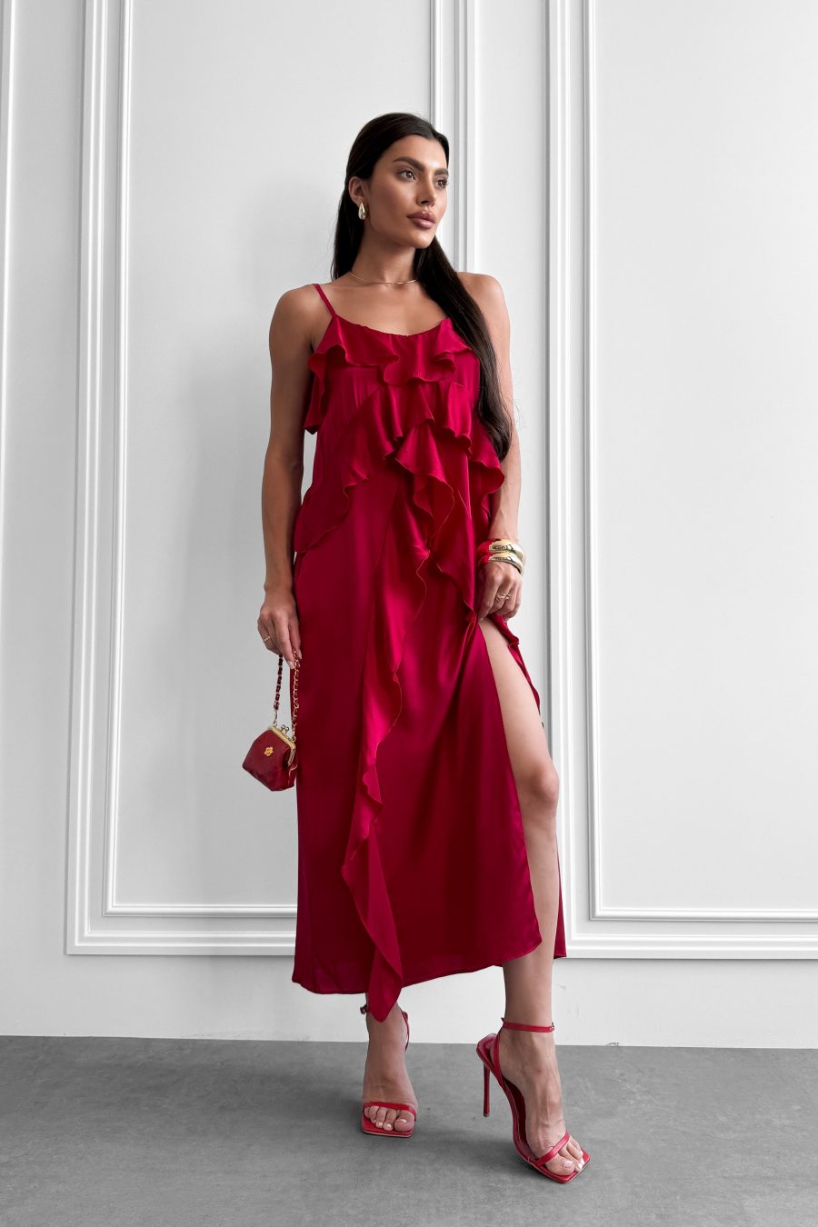 Dress made of natural silk on thin straps with flounces
