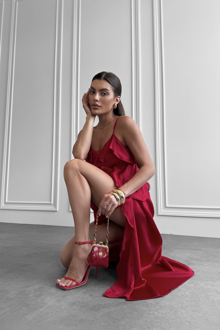 Dress made of natural silk on thin straps with flounces