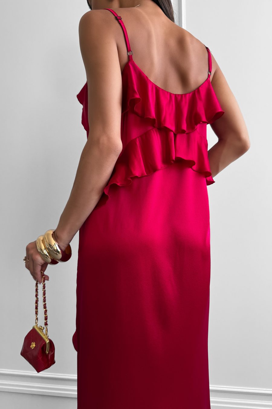 Dress made of natural silk on thin straps with flounces