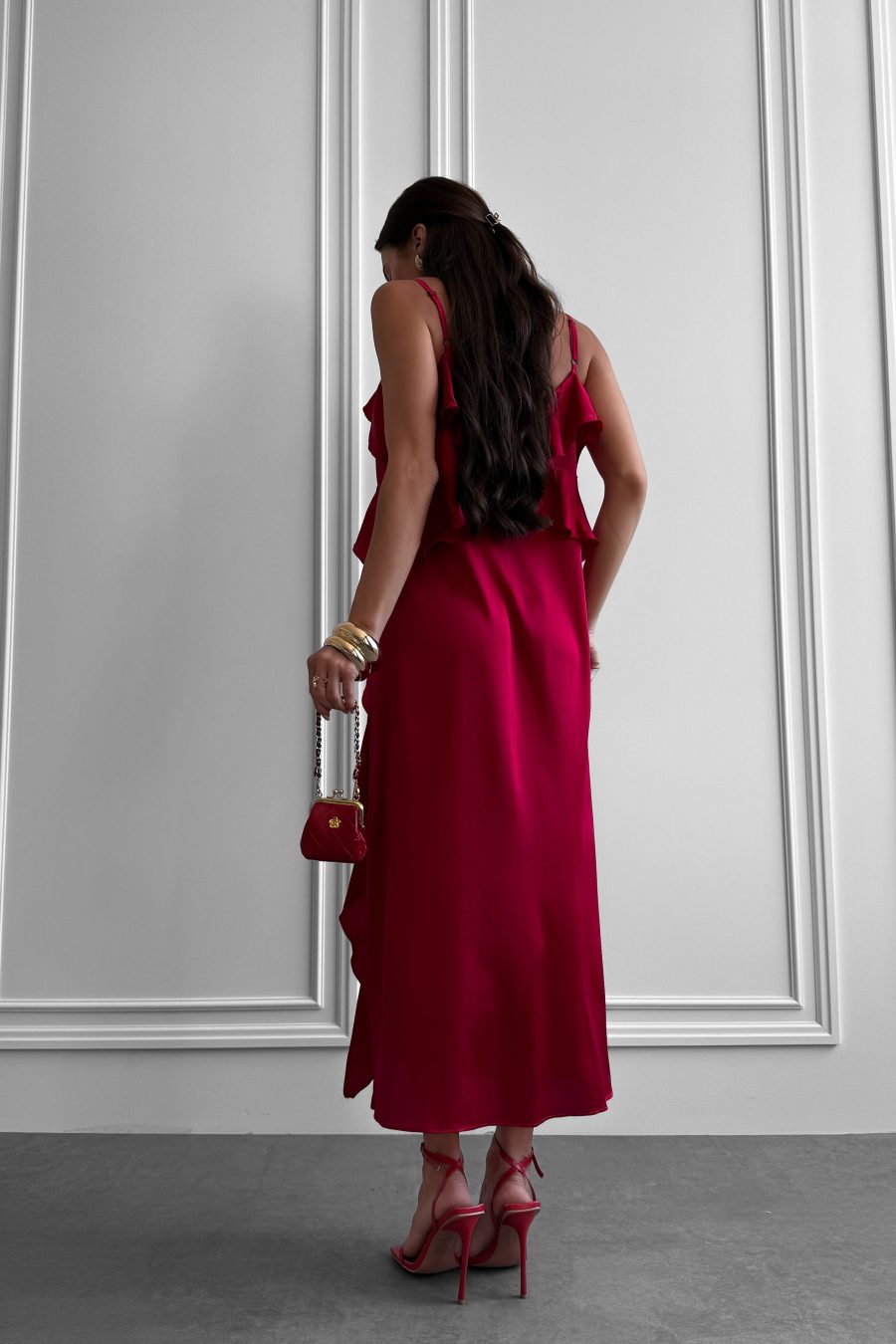 Dress made of natural silk on thin straps with flounces