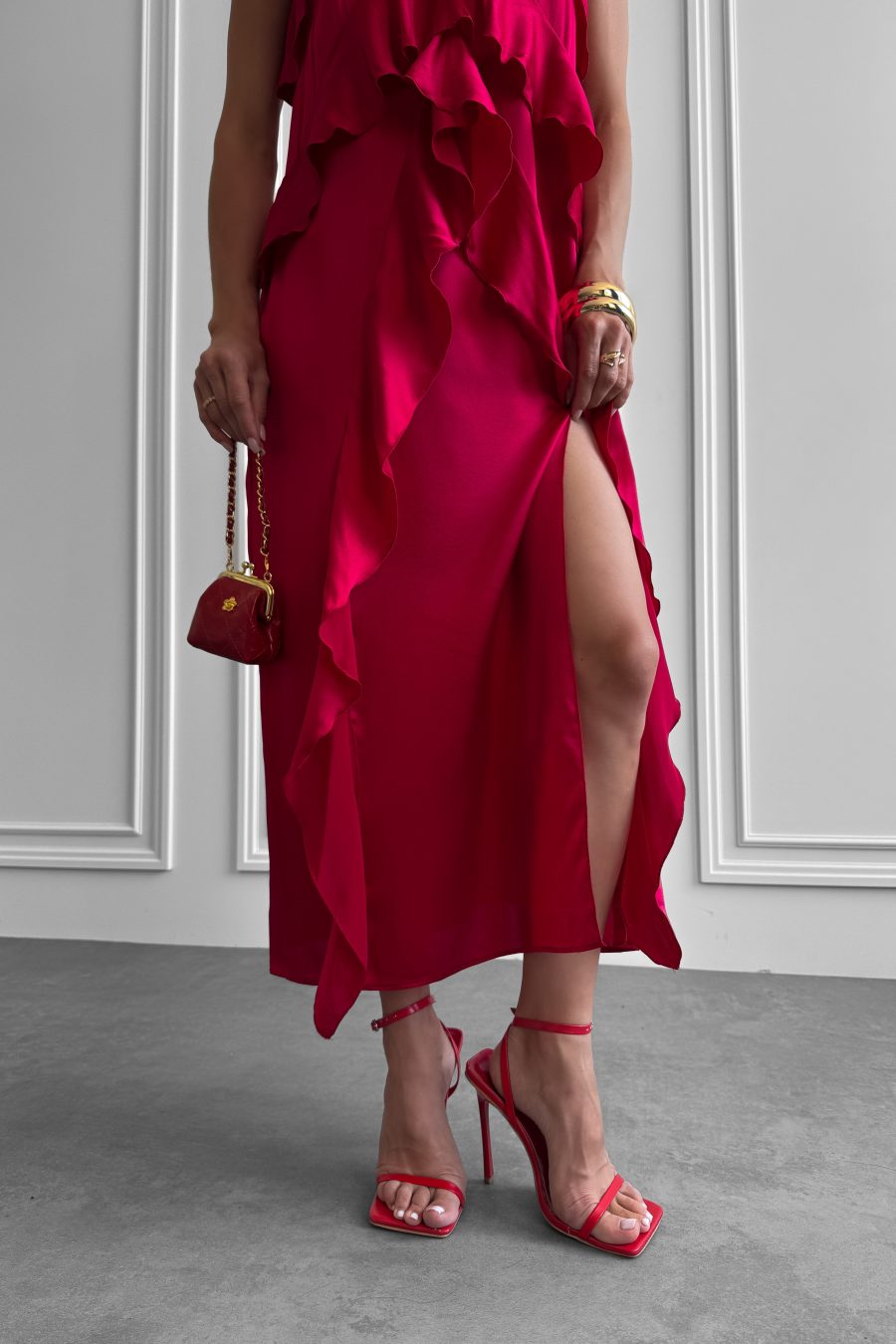 Dress made of natural silk on thin straps with flounces