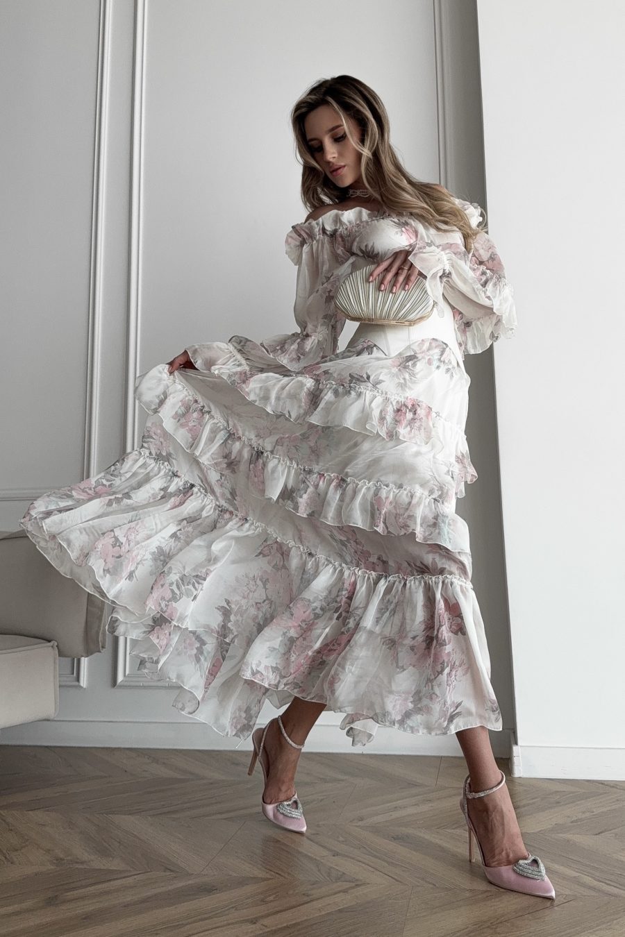 Long loose-fitting dress with open shoulders made of natural silk