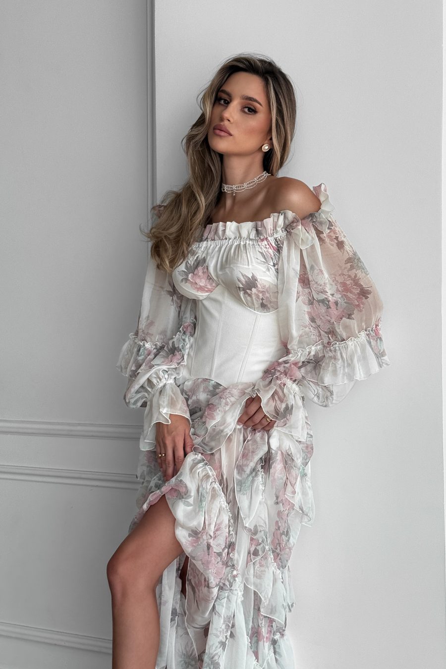 Long loose-fitting dress with open shoulders made of natural silk