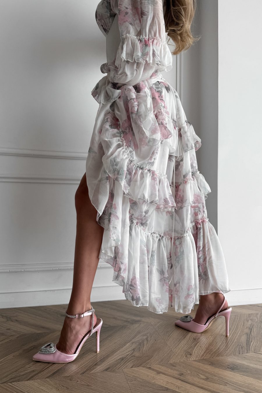 Long loose-fitting dress with open shoulders made of natural silk