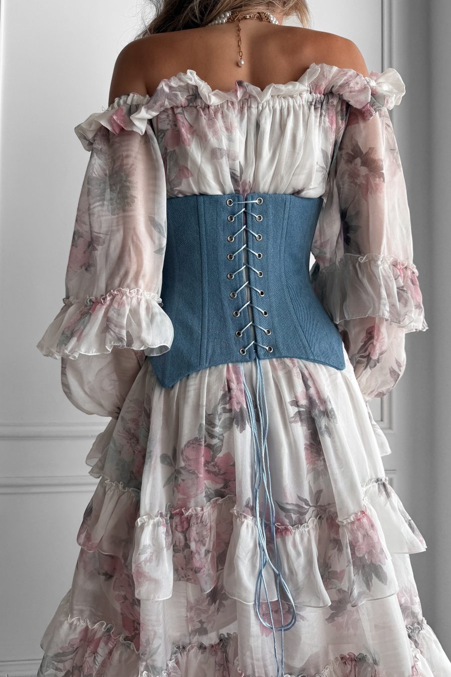 Long loose-fitting dress with open shoulders made of natural silk